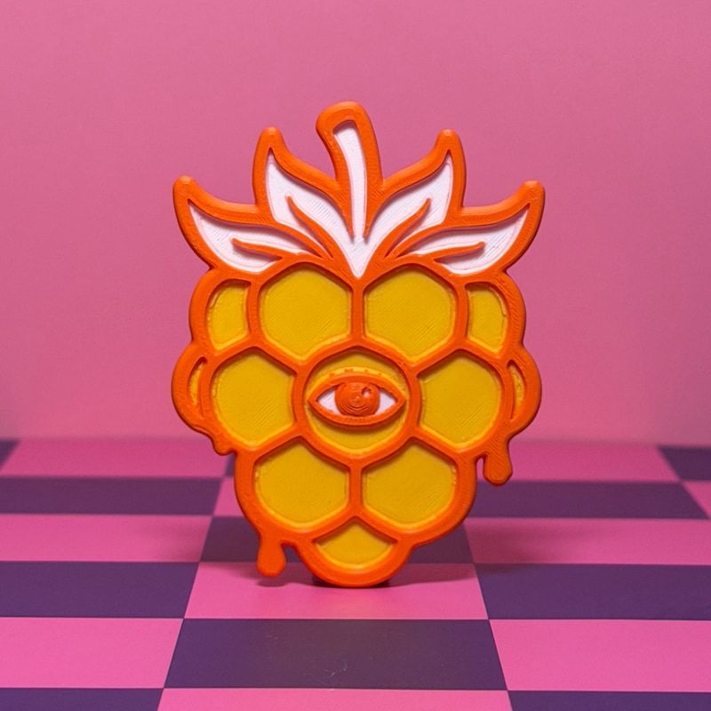 The sun berry — orange, with an eye at its center.
